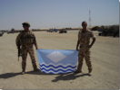 Troops holding the IW flag